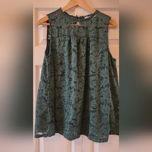 Green lace overlay sleeveless top.
